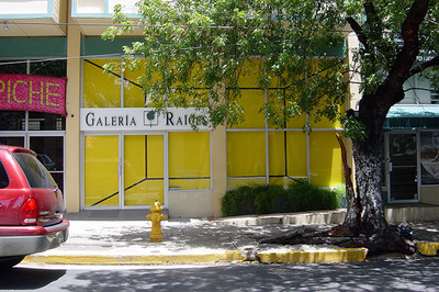street view of a storefront covered in yellow color